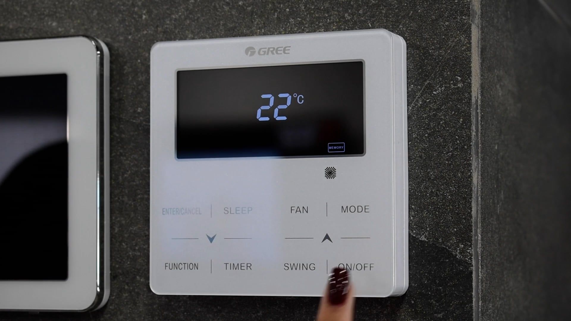 Close-up of a wall-mounted HVAC control panel display